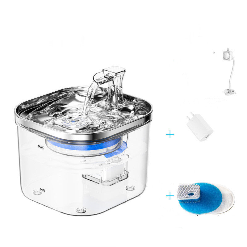 Clear pet water fountain with additional components on a white background